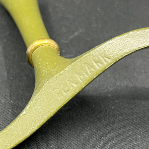 Green enameled candlestick by Jens Harald Quistgaard