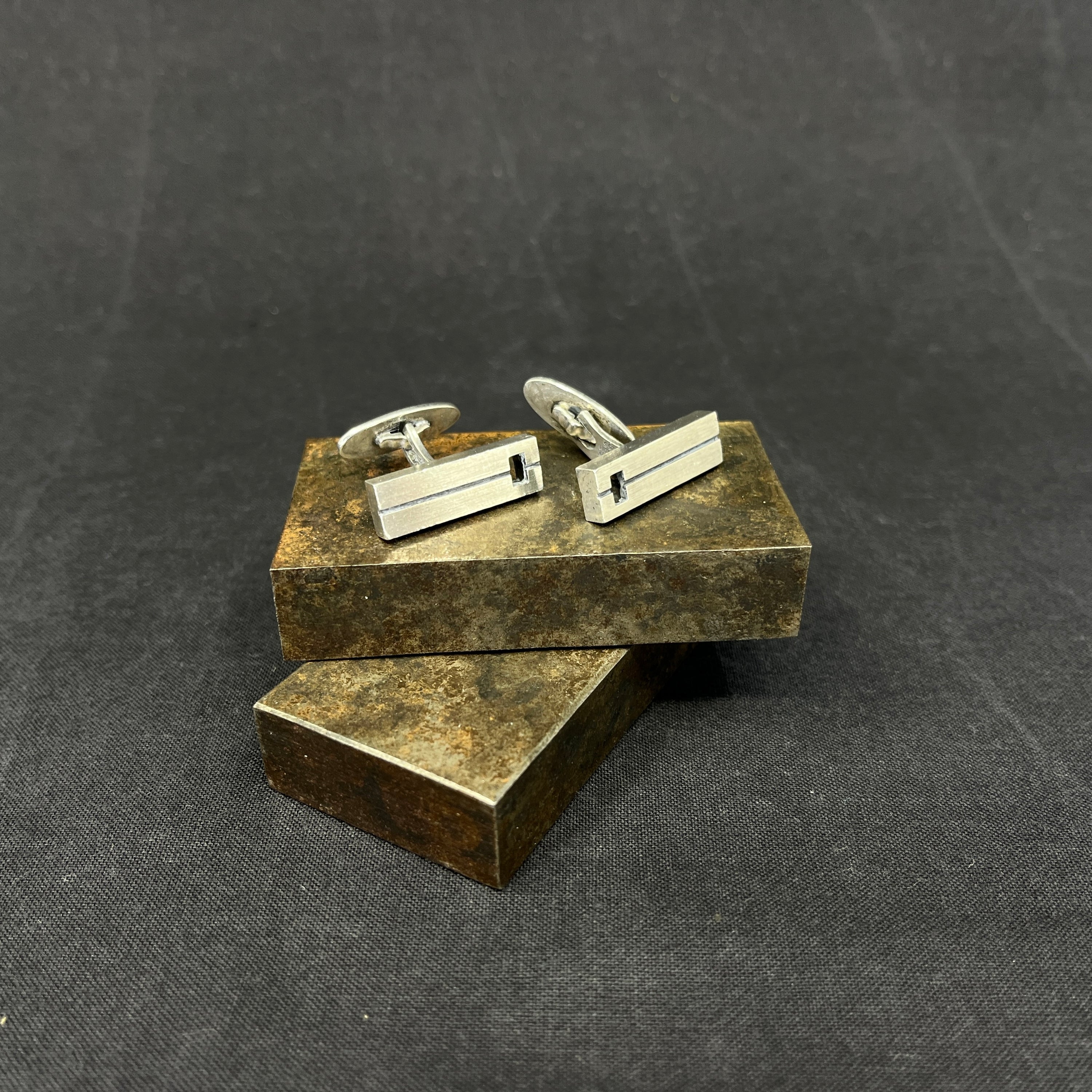 A pair of NE From cufflinks