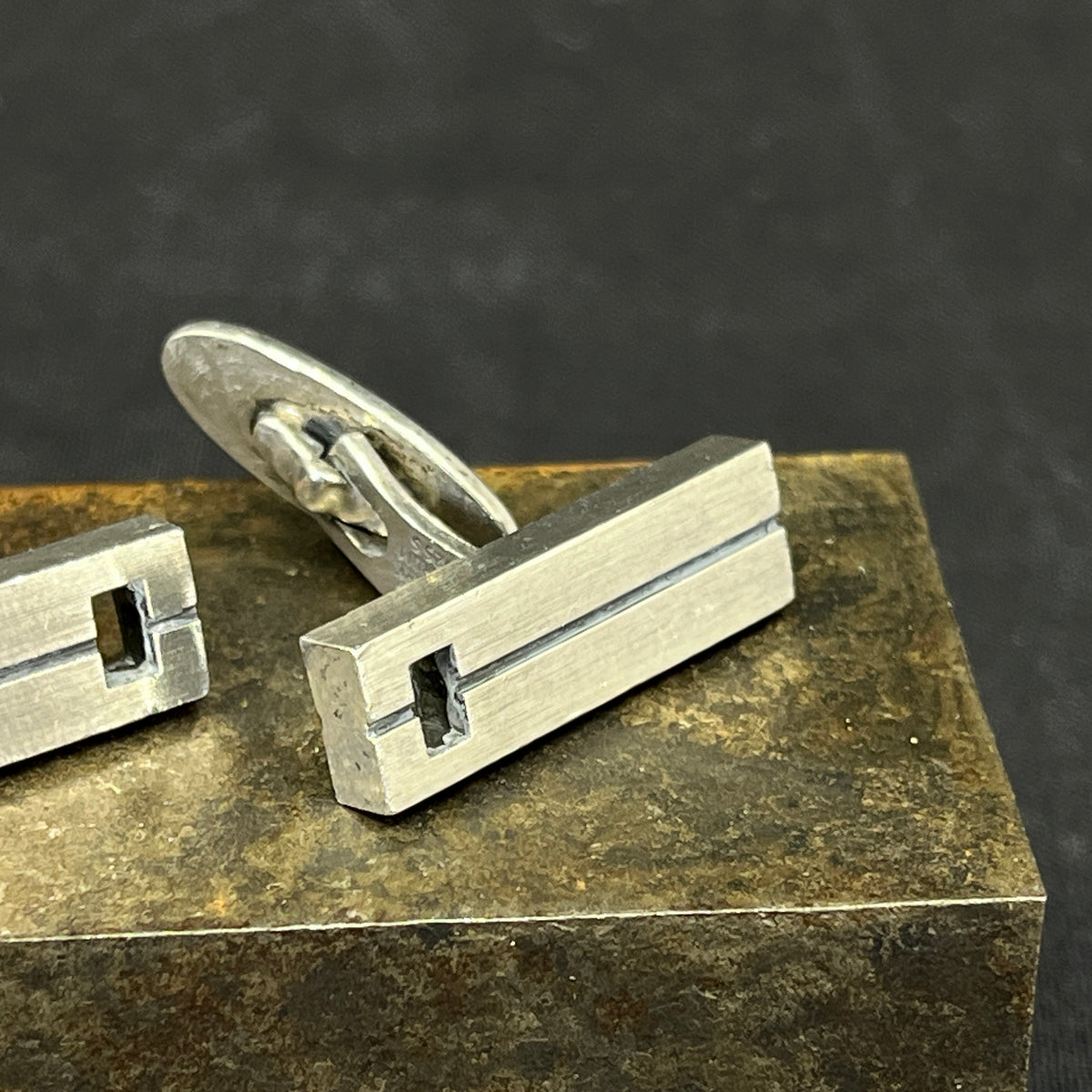 A pair of NE From cufflinks