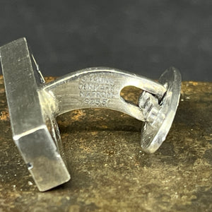 A pair of NE From cufflinks