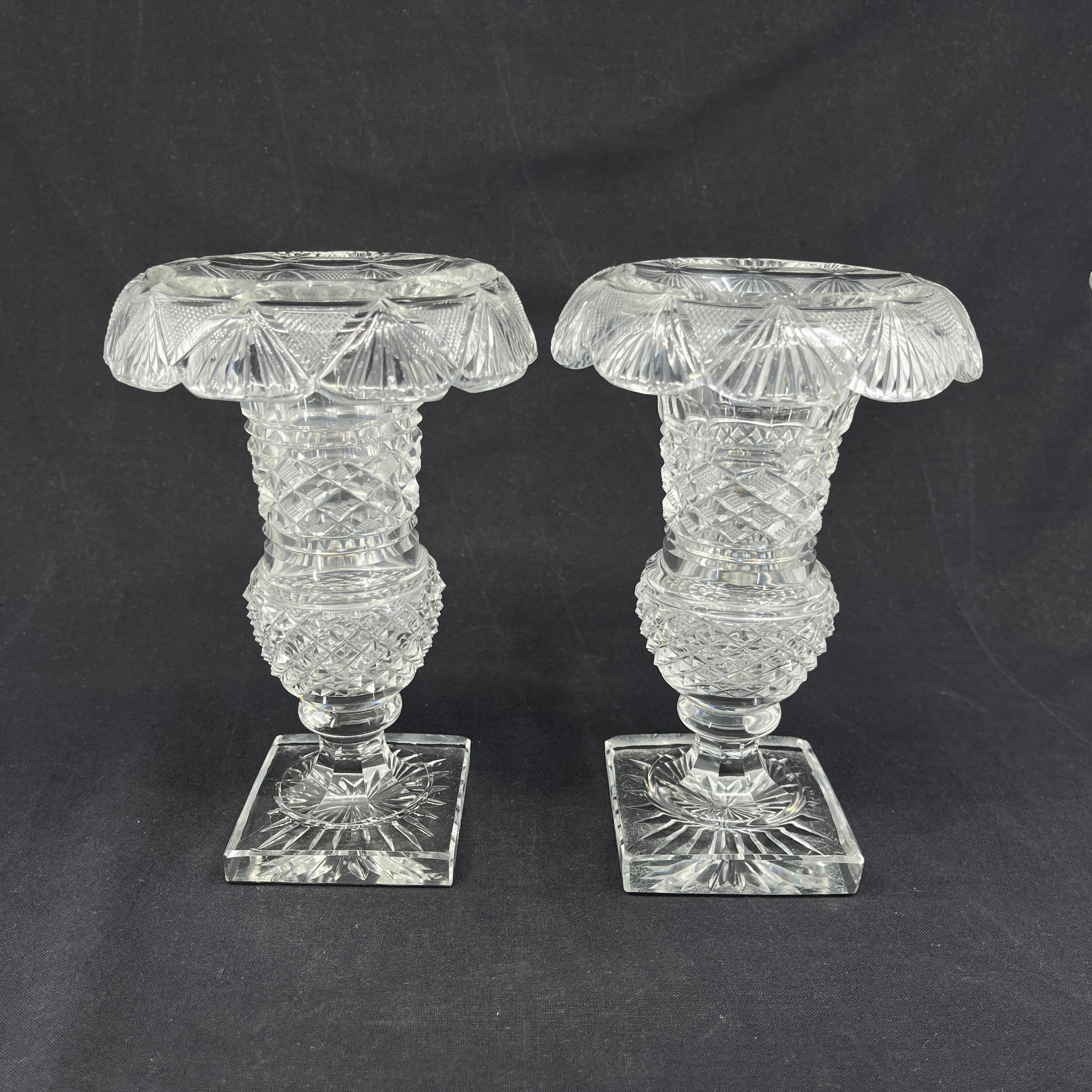 A pair of crystal glass crater vases