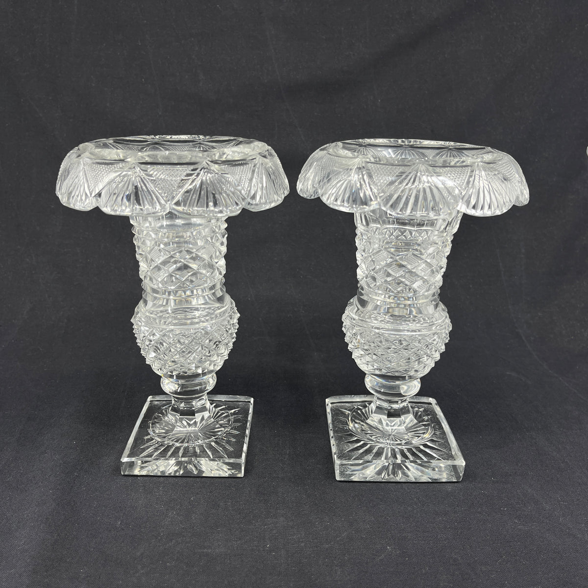 A pair of crystal glass crater vases