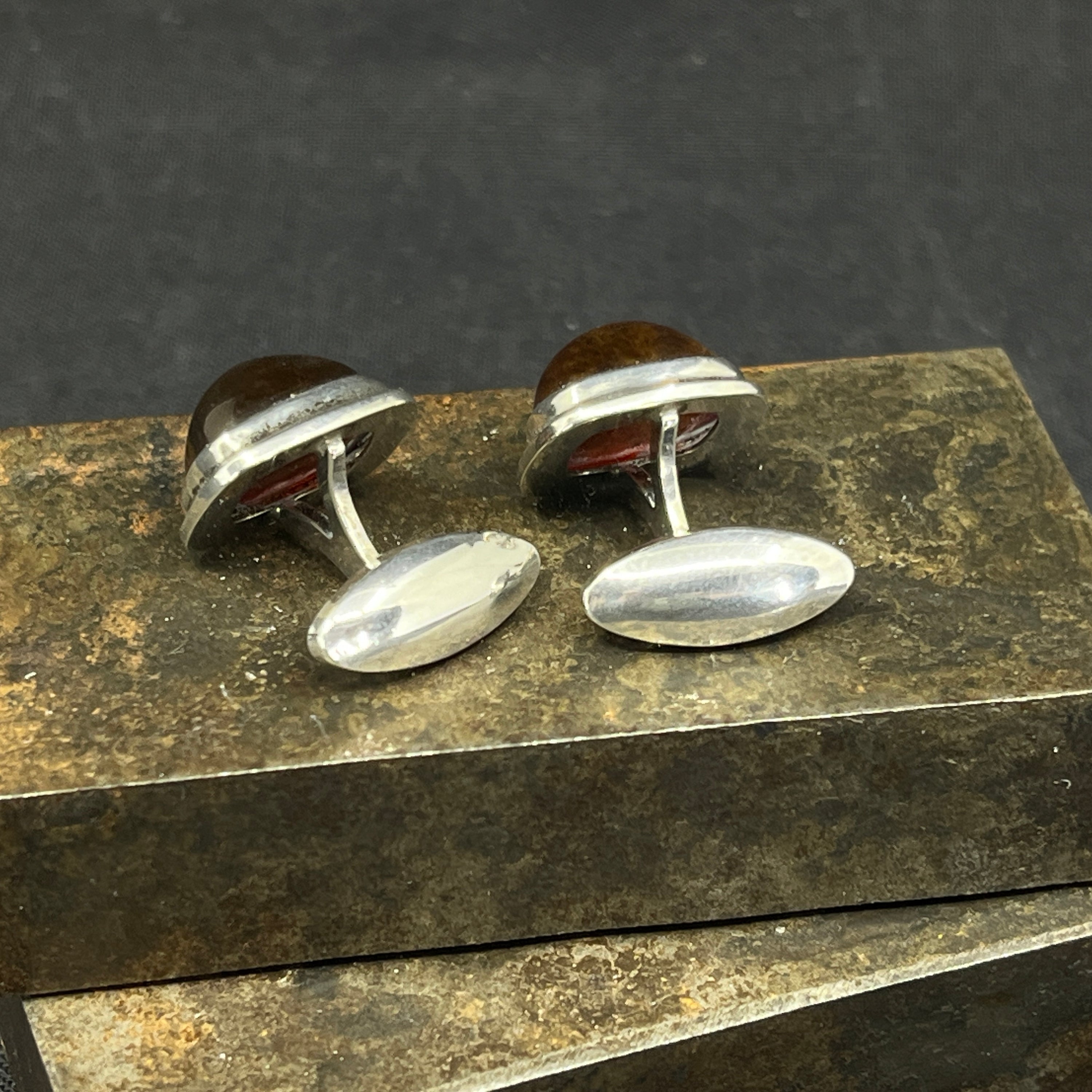 A pair of modern amber cufflinks