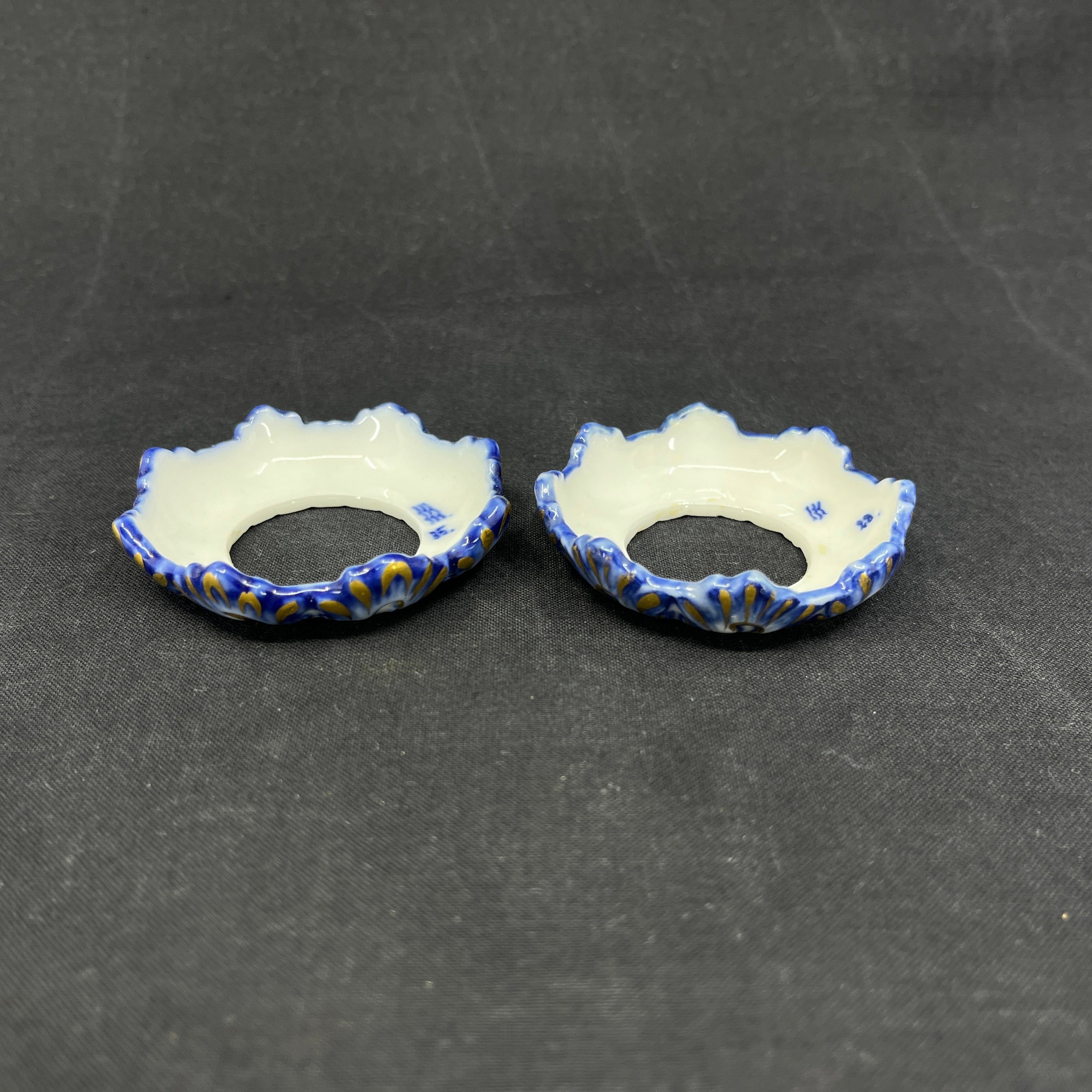A pair of Blue Fluted light cuffs with gold
