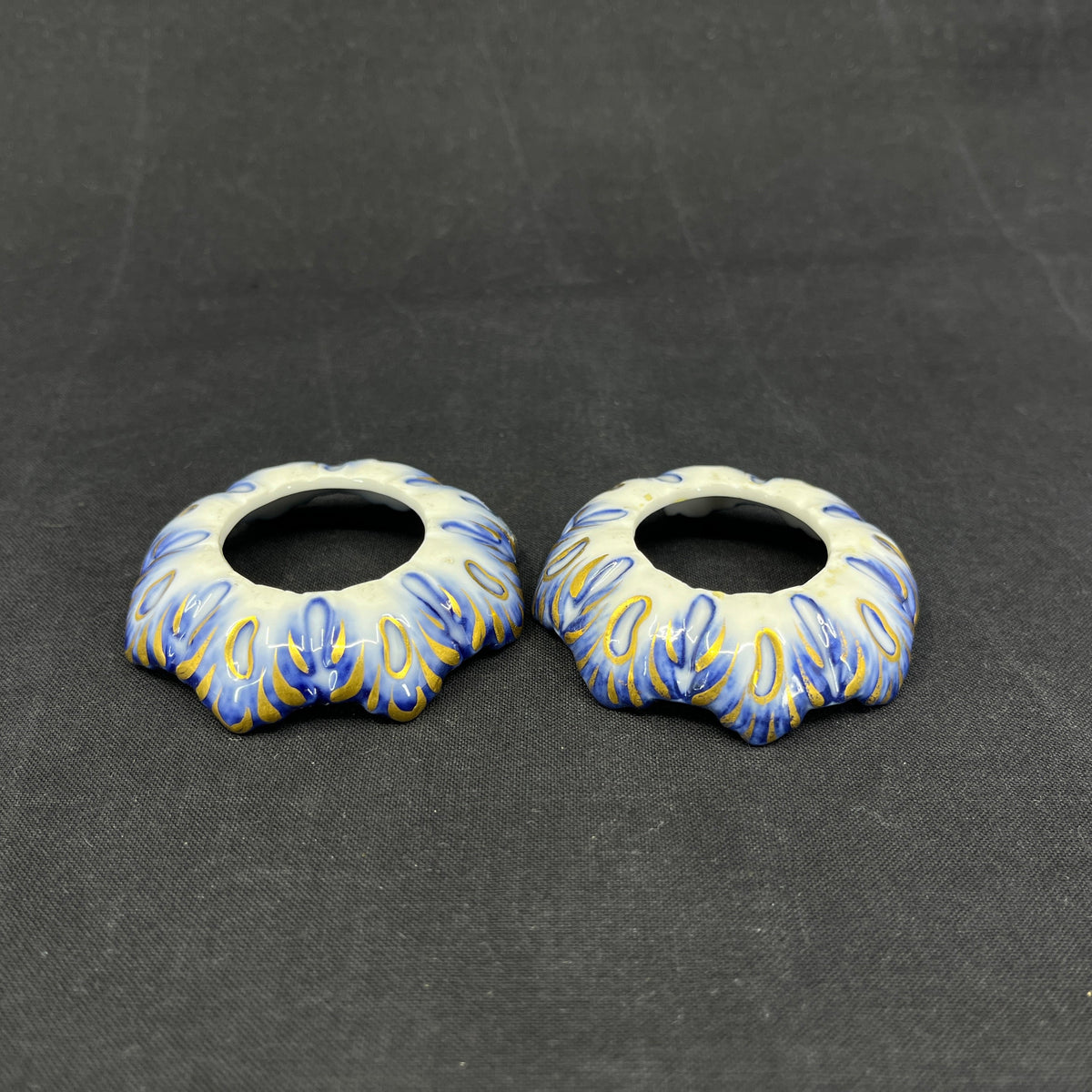 A pair of Blue Fluted light cuffs with gold
