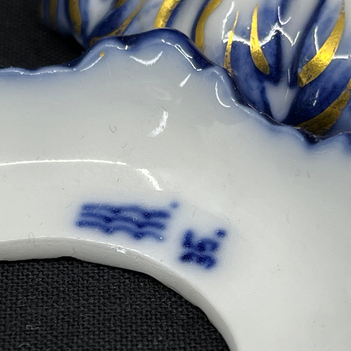 A pair of Blue Fluted light cuffs with gold