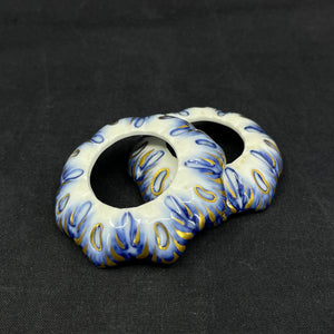 A pair of Blue Fluted light cuffs with gold