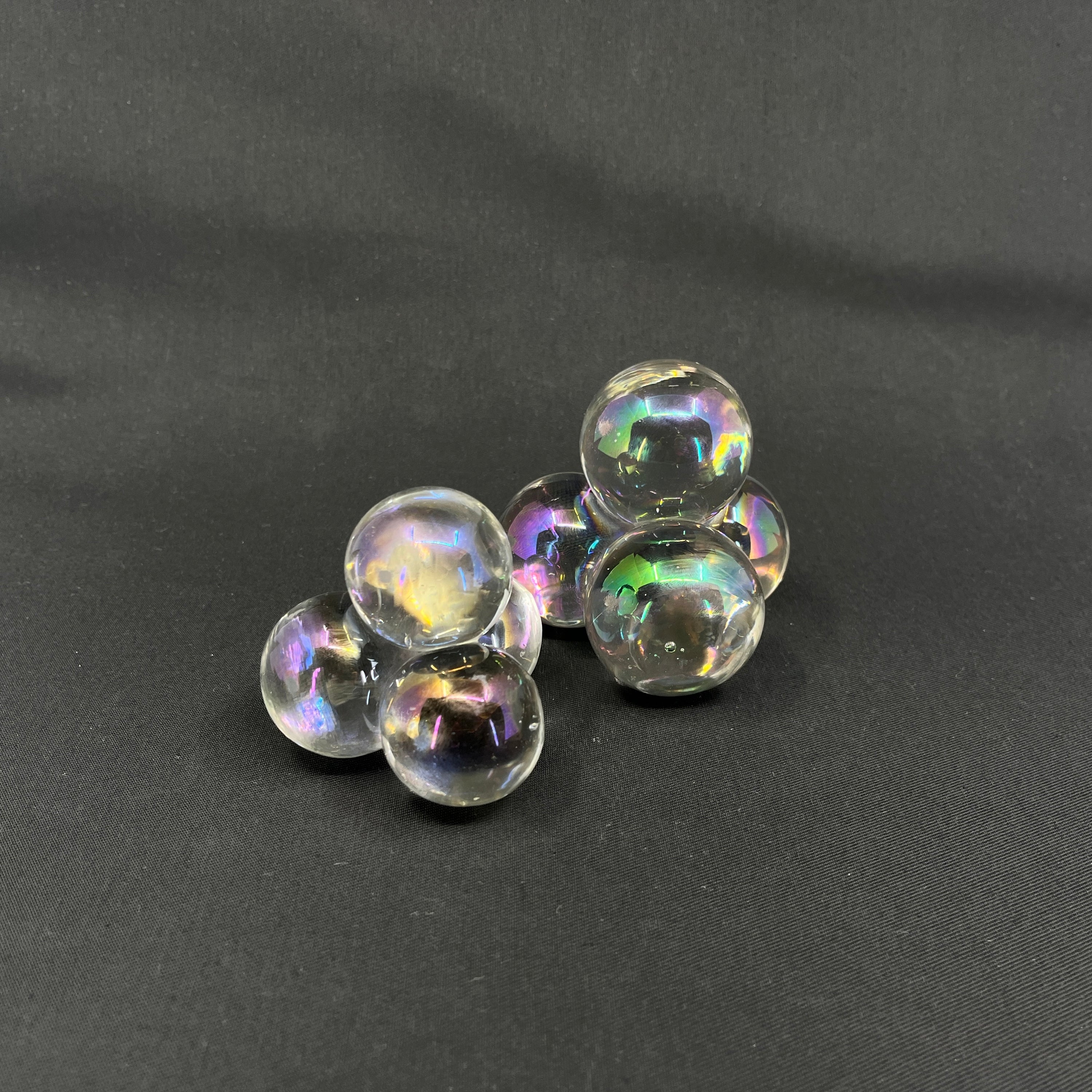 A pair of quirky glass paperweights