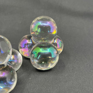 A pair of quirky glass paperweights