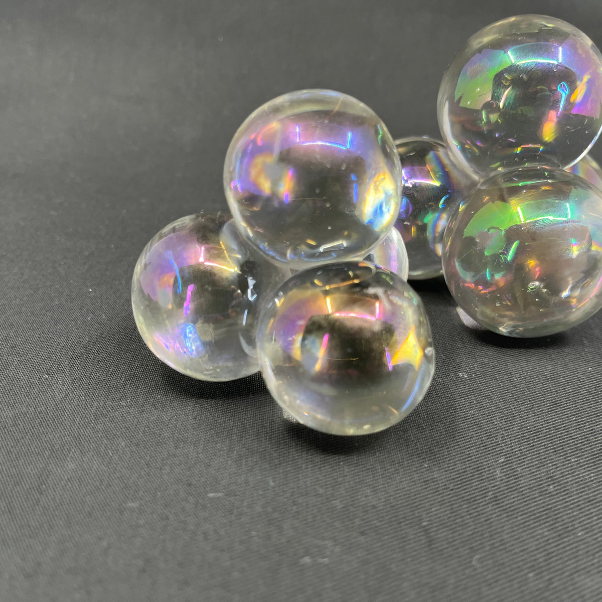A pair of quirky glass paperweights