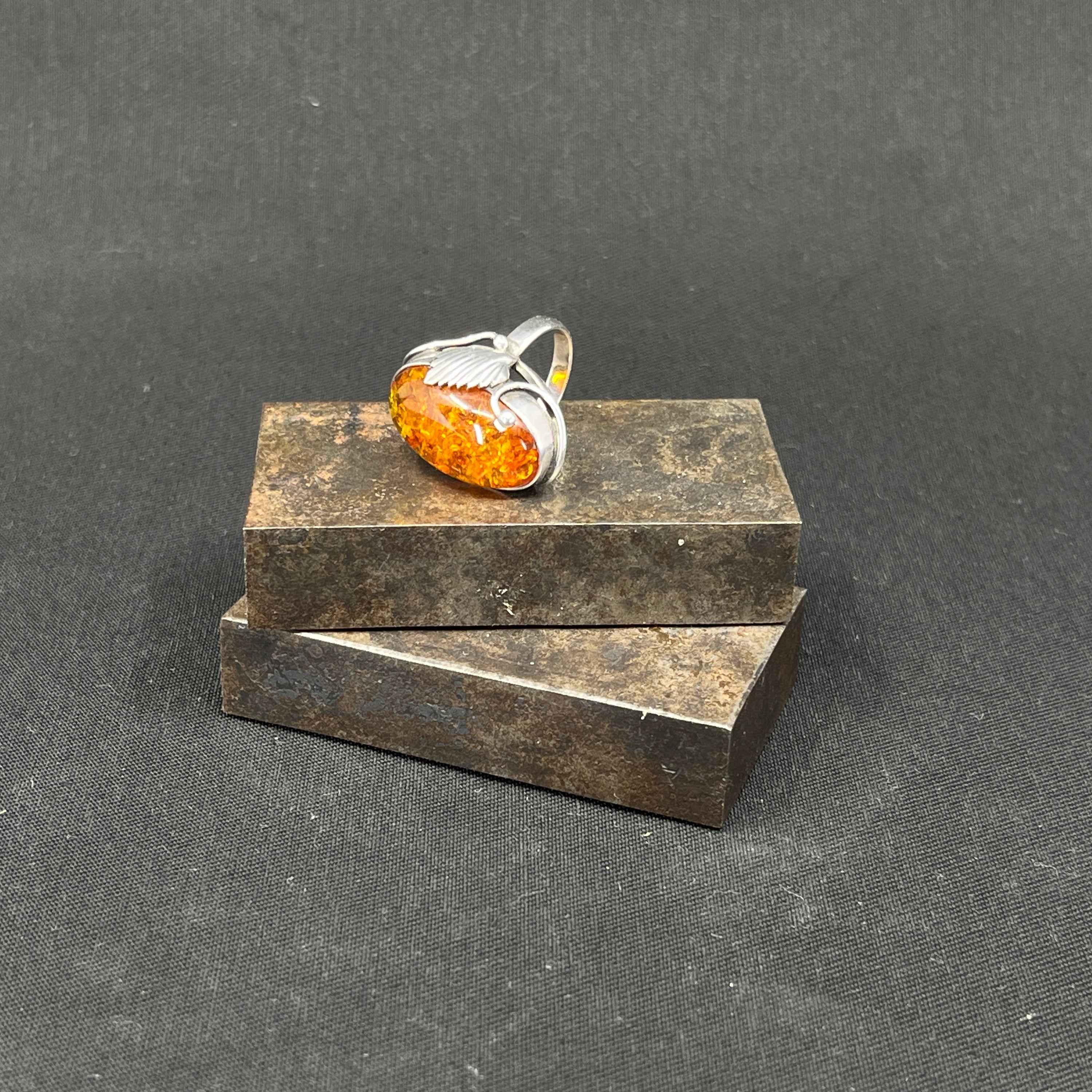 Ring with amber and leaf