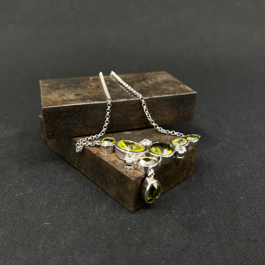 Necklace in silver with green stones
