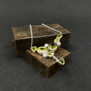 Necklace in silver with green stones