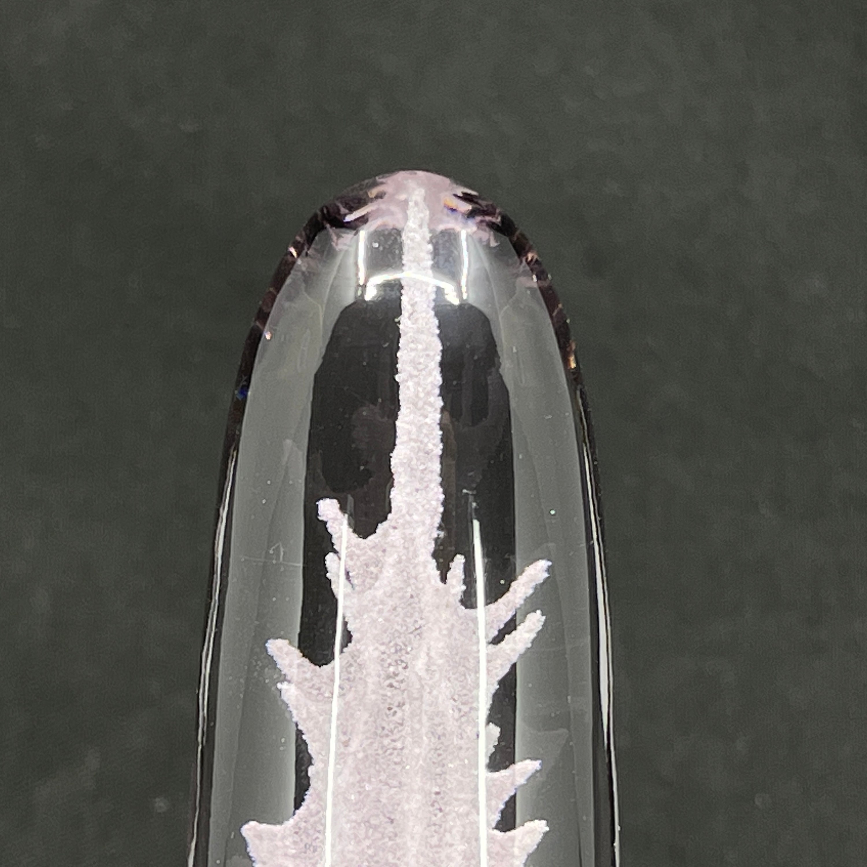 Large slightly over-colored silver pyramid