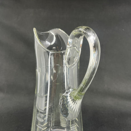 Fine glass jug with many cuts, 24.5 cm.