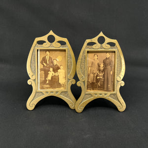 A pair of 1920s brass picture frames