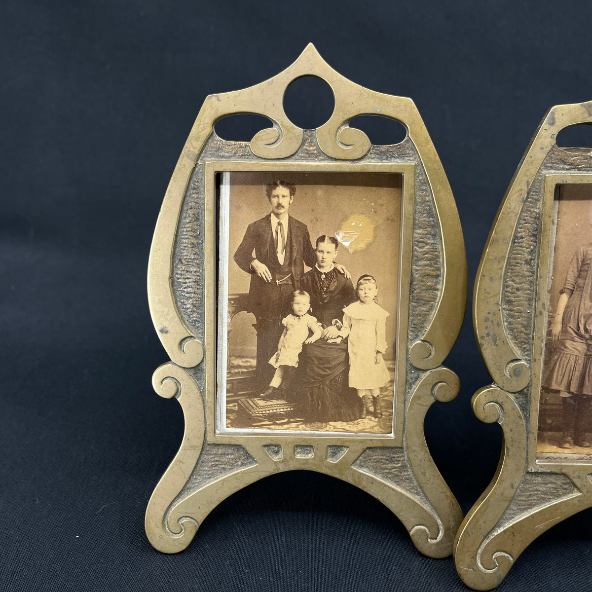 A pair of 1920s brass picture frames
