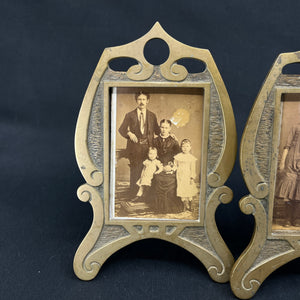 A pair of 1920s brass picture frames