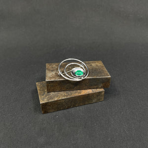 Brooch with green stone by N E From