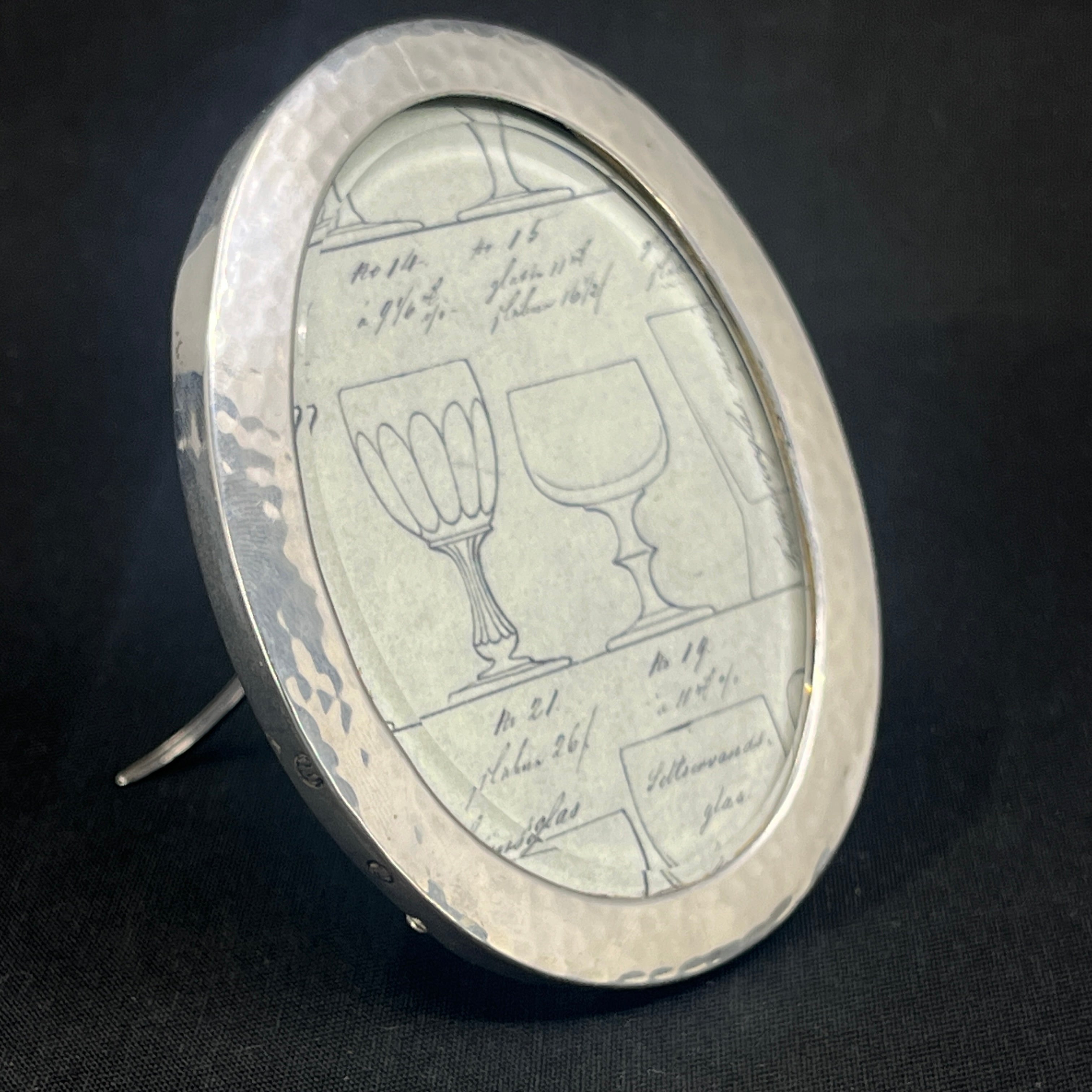 Oval sølvramme, 9,5x7,5 cm.