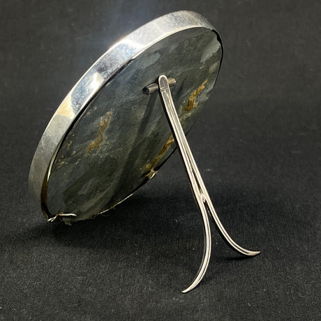 Oval silver frame, 9.5x7.5 cm.