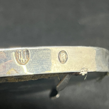 Oval silver frame, 9.5x7.5 cm.