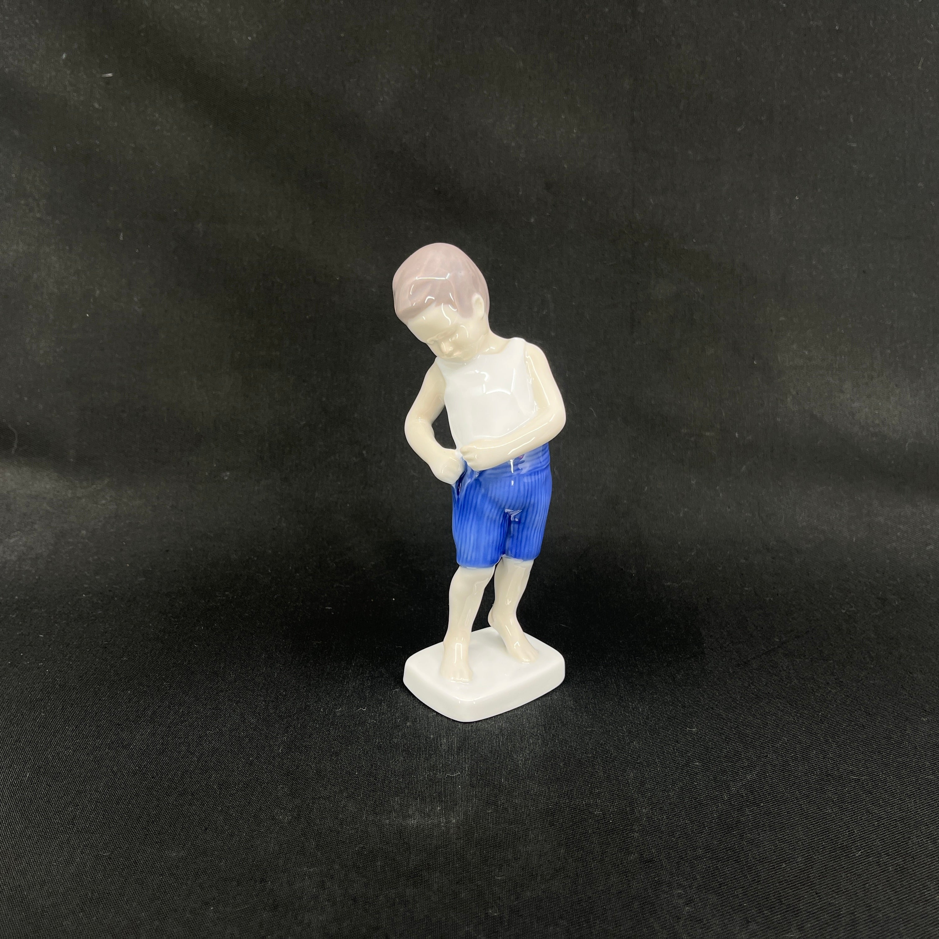Bing & Grøndahl figurine - boy in blue pants