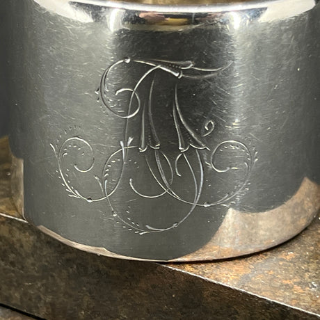 Round silver napkin ring from the 1910s