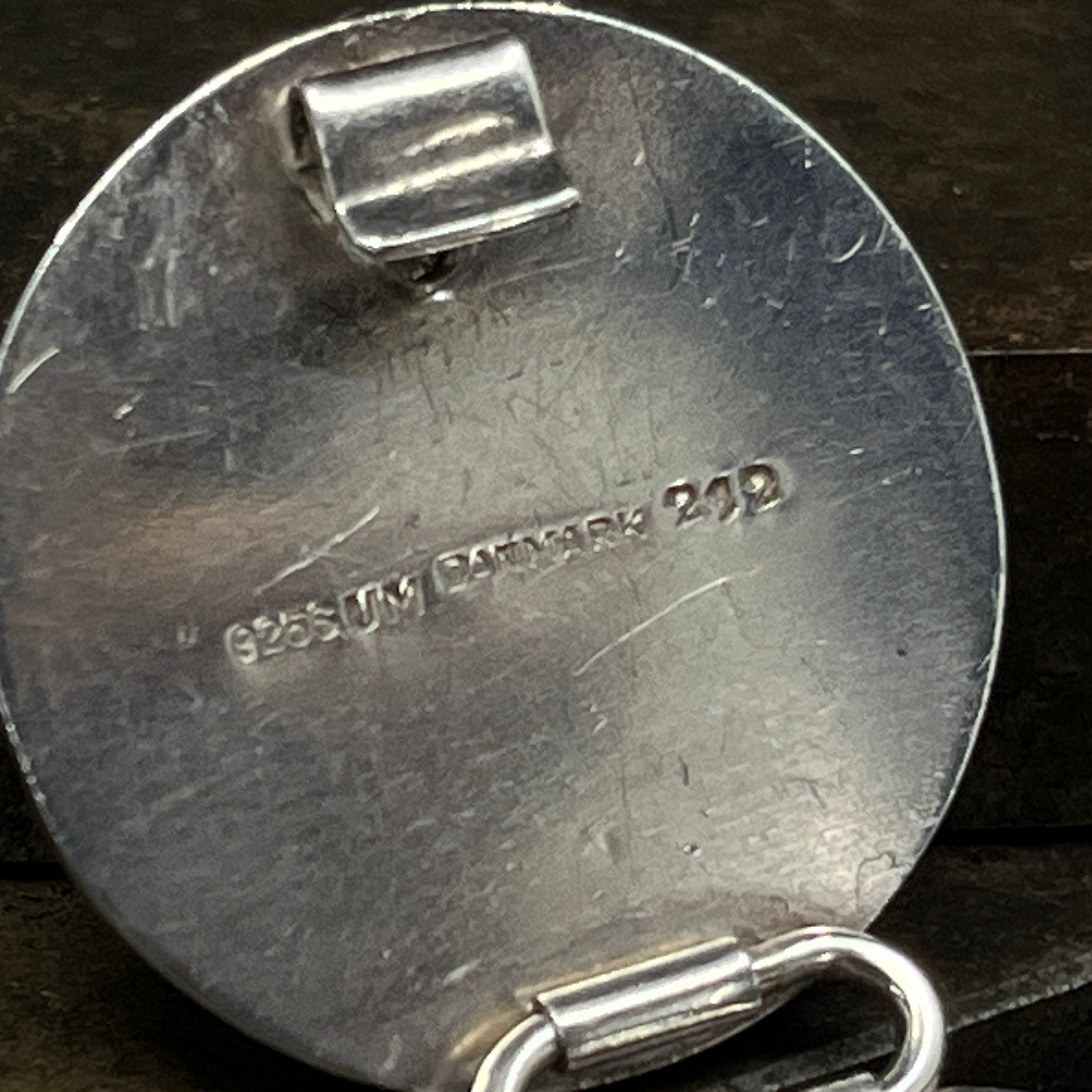 Armlænke med tigerøje af Uwe Moltke