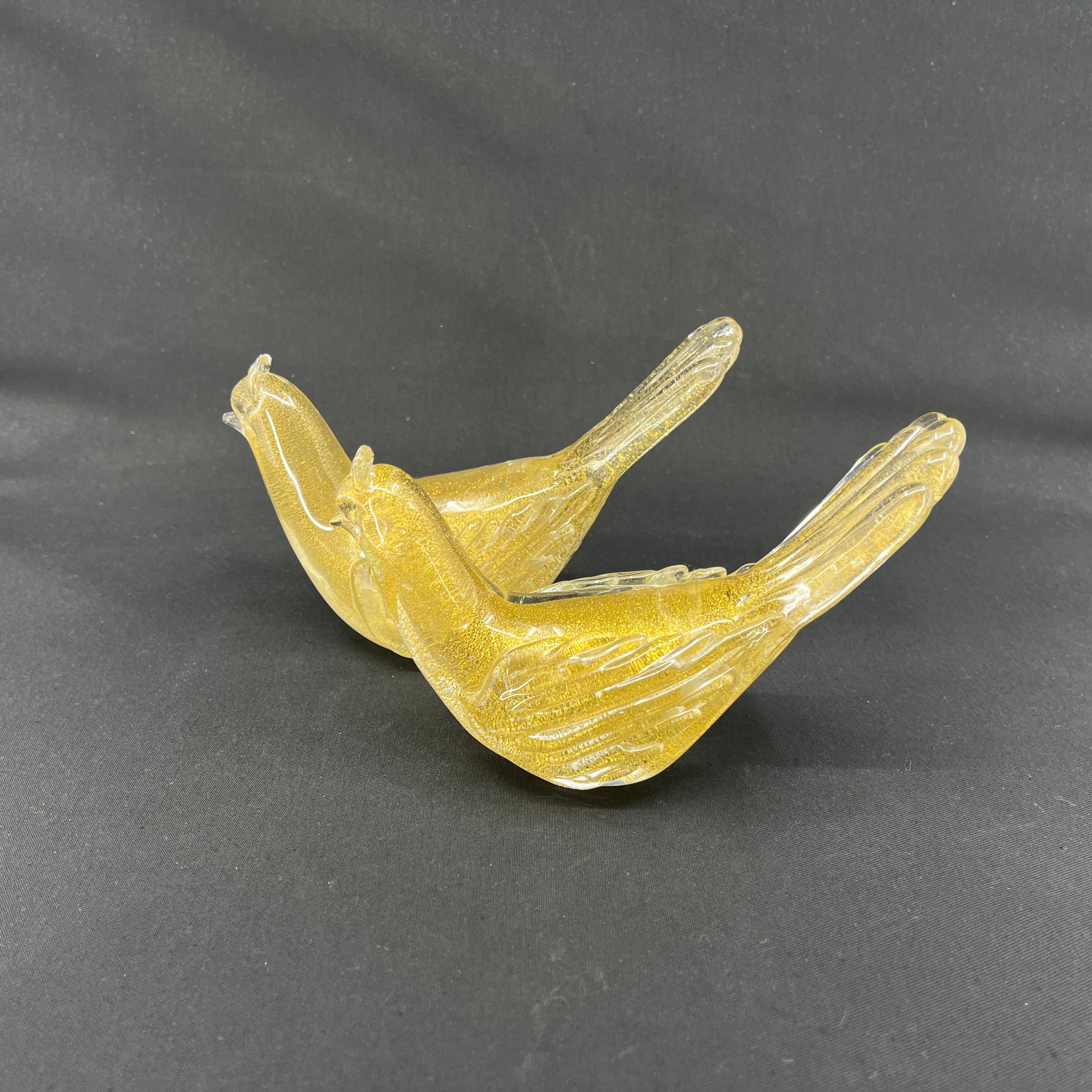 Et par Murano fugle med guld