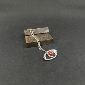 Modern amber pendant from N. E. From