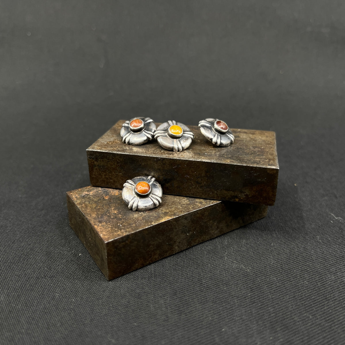 4 buttons with amber
