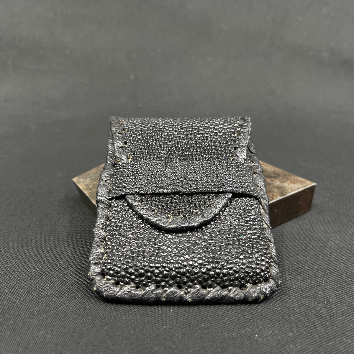 Black purse made of skin from a stingray