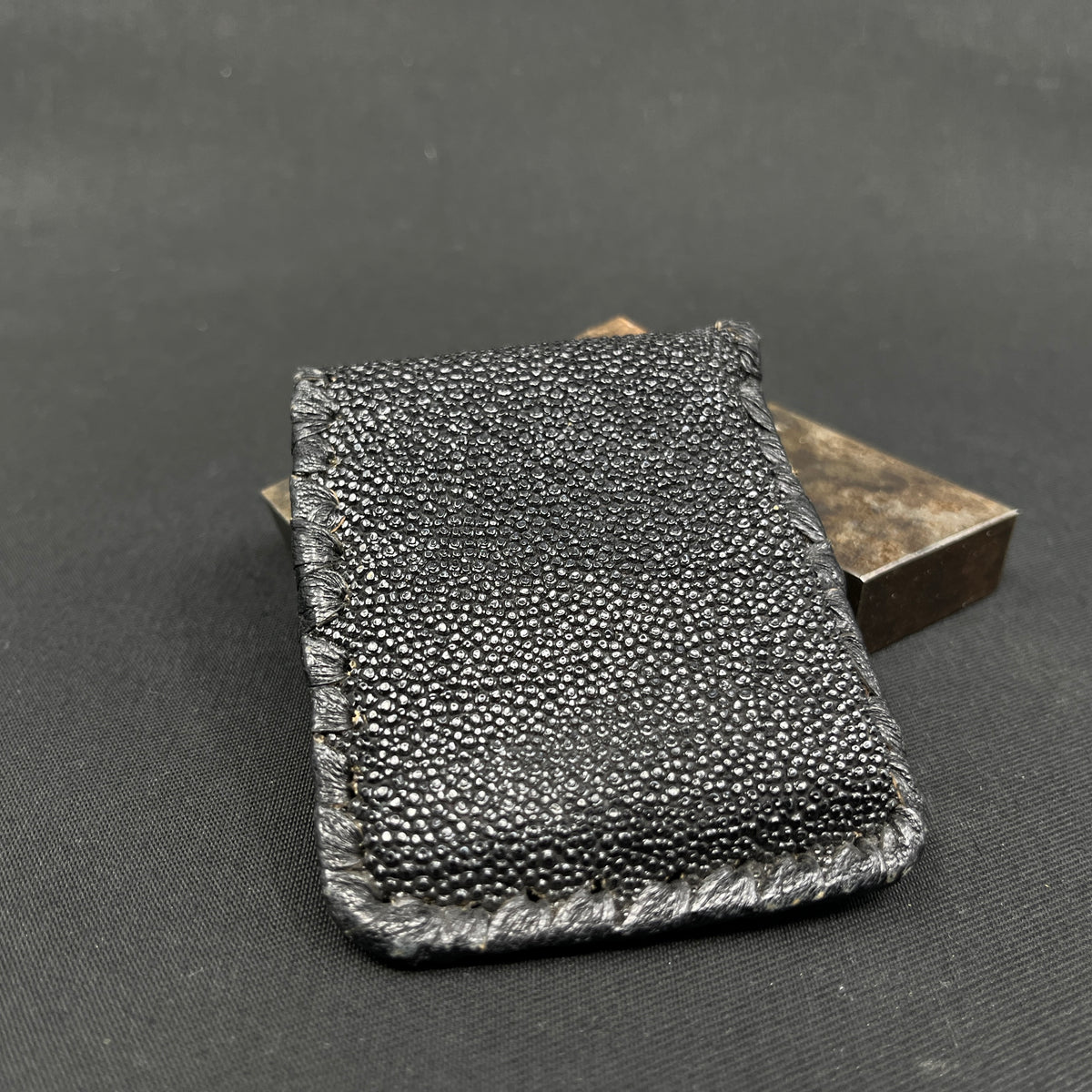 Black purse made of skin from a stingray