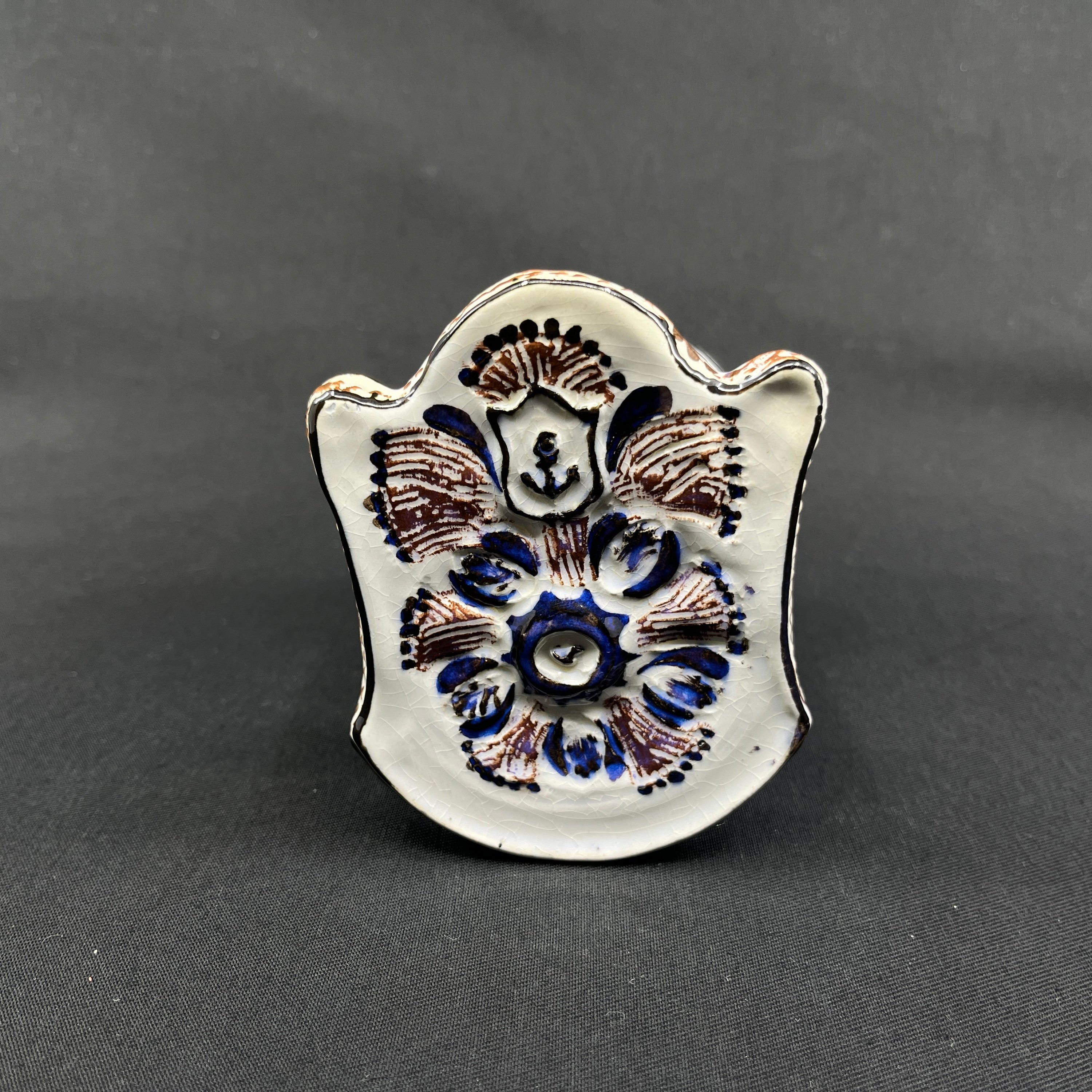 Rare Tenera piggy bank - child in cradle