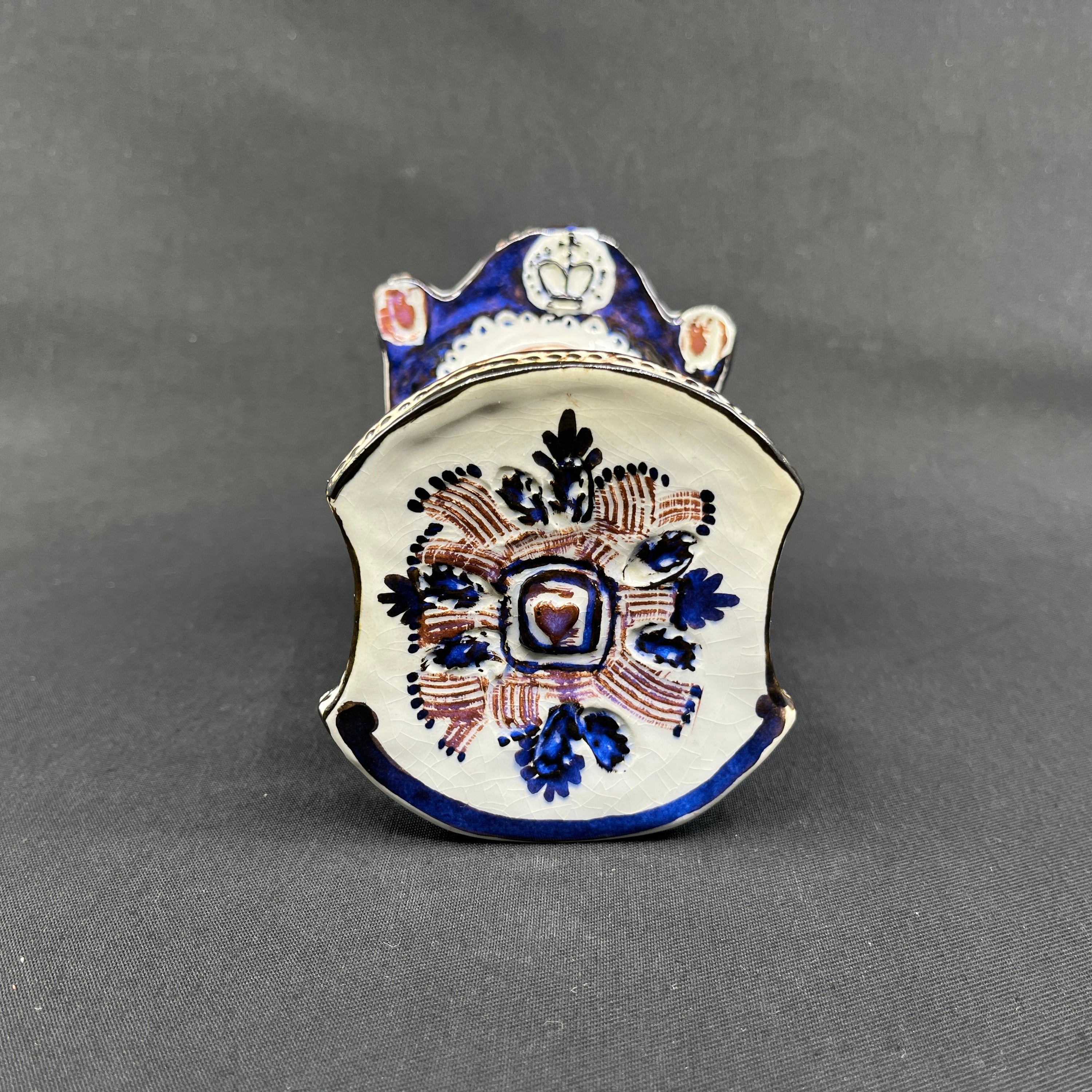 Rare Tenera piggy bank - child in cradle