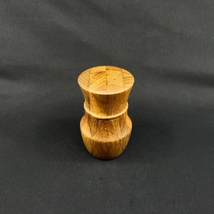 Modern pepper mill in teak