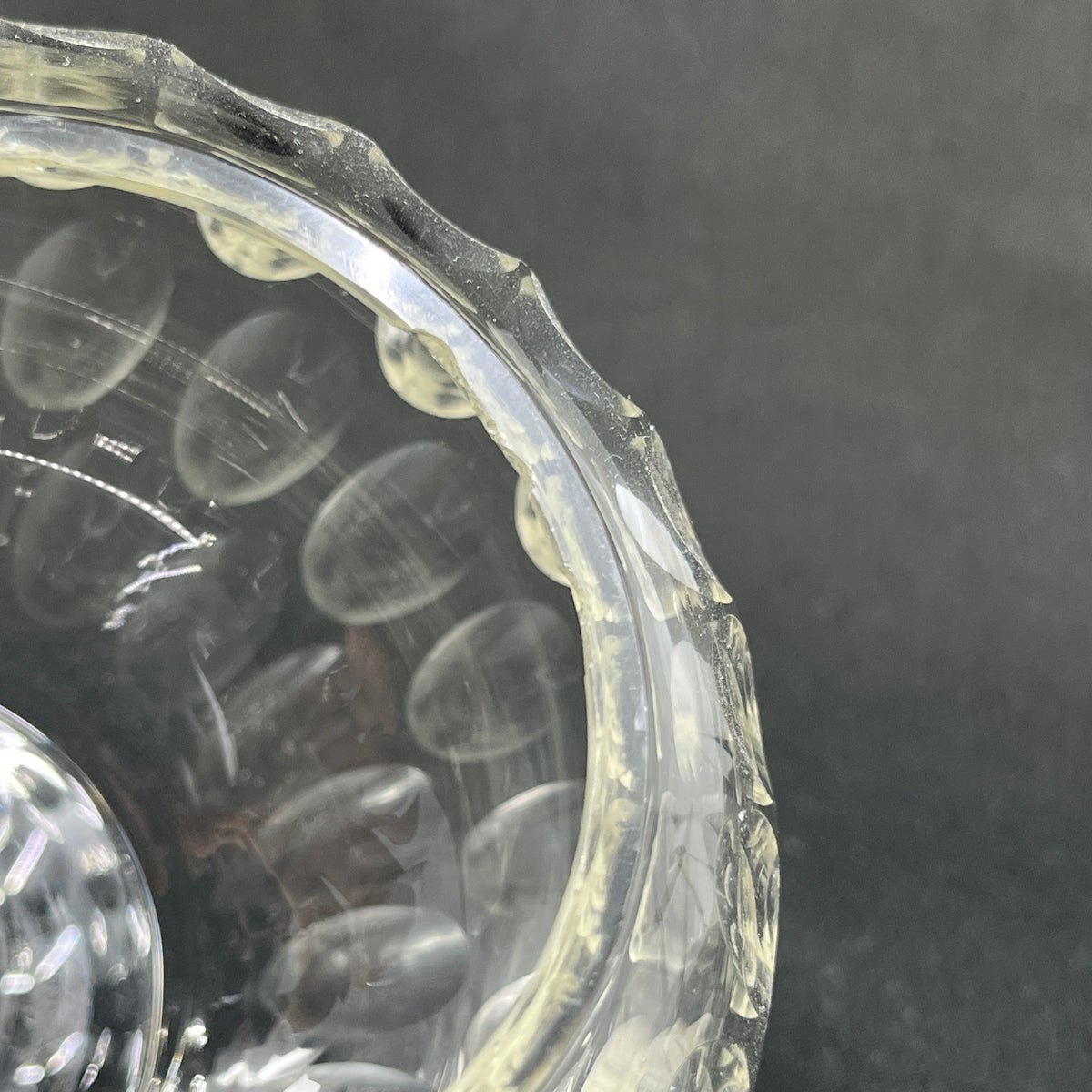 Spherical vase with olive carvings