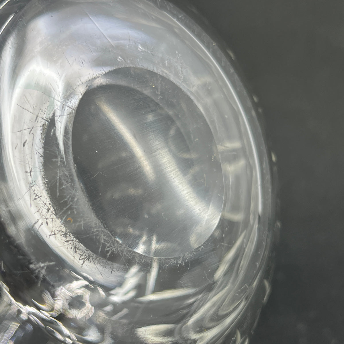 Spherical vase with olive carvings