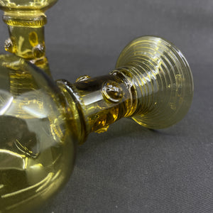 A pair of antique Röhmer glasses with hollow stems