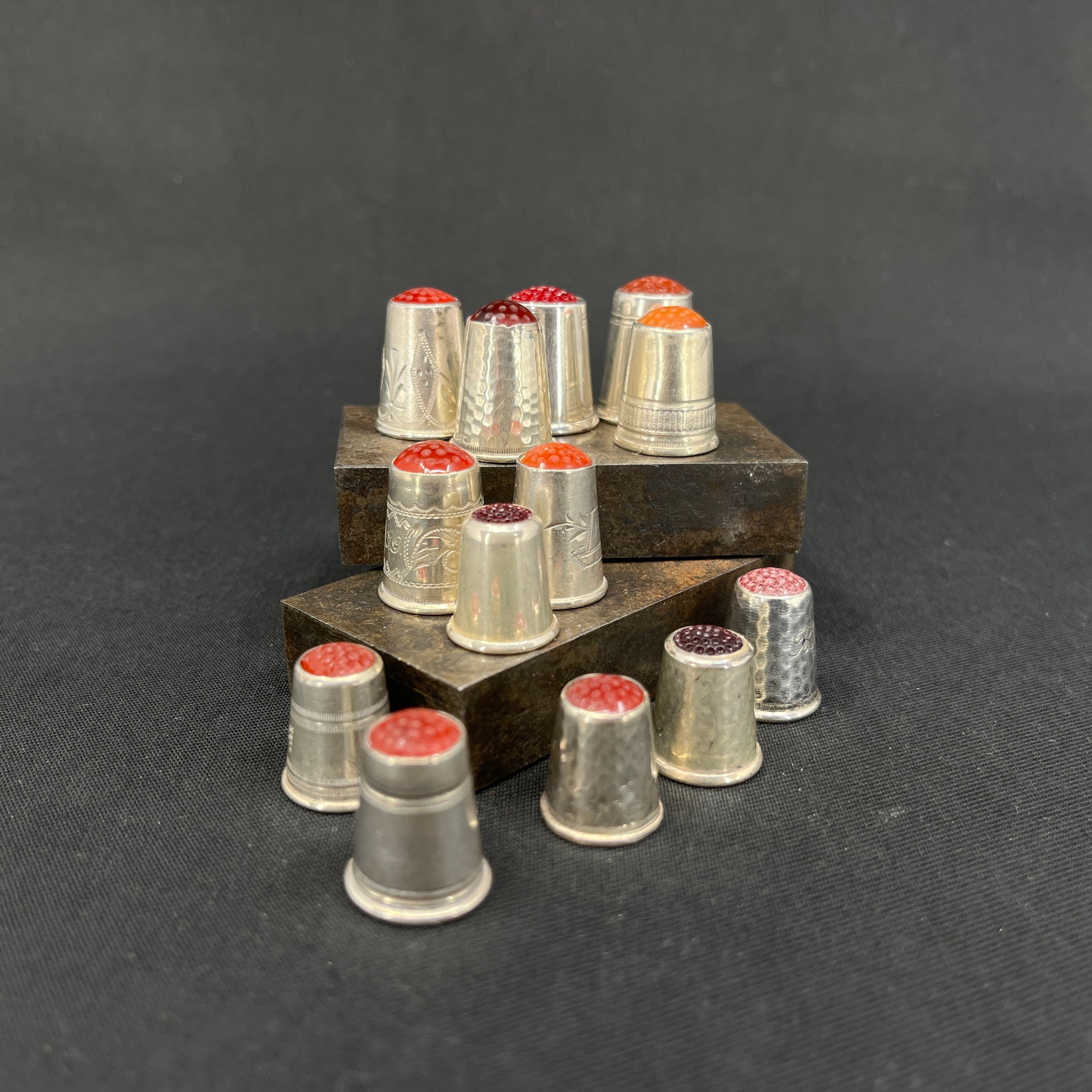 Silver thimble with stones - red shades