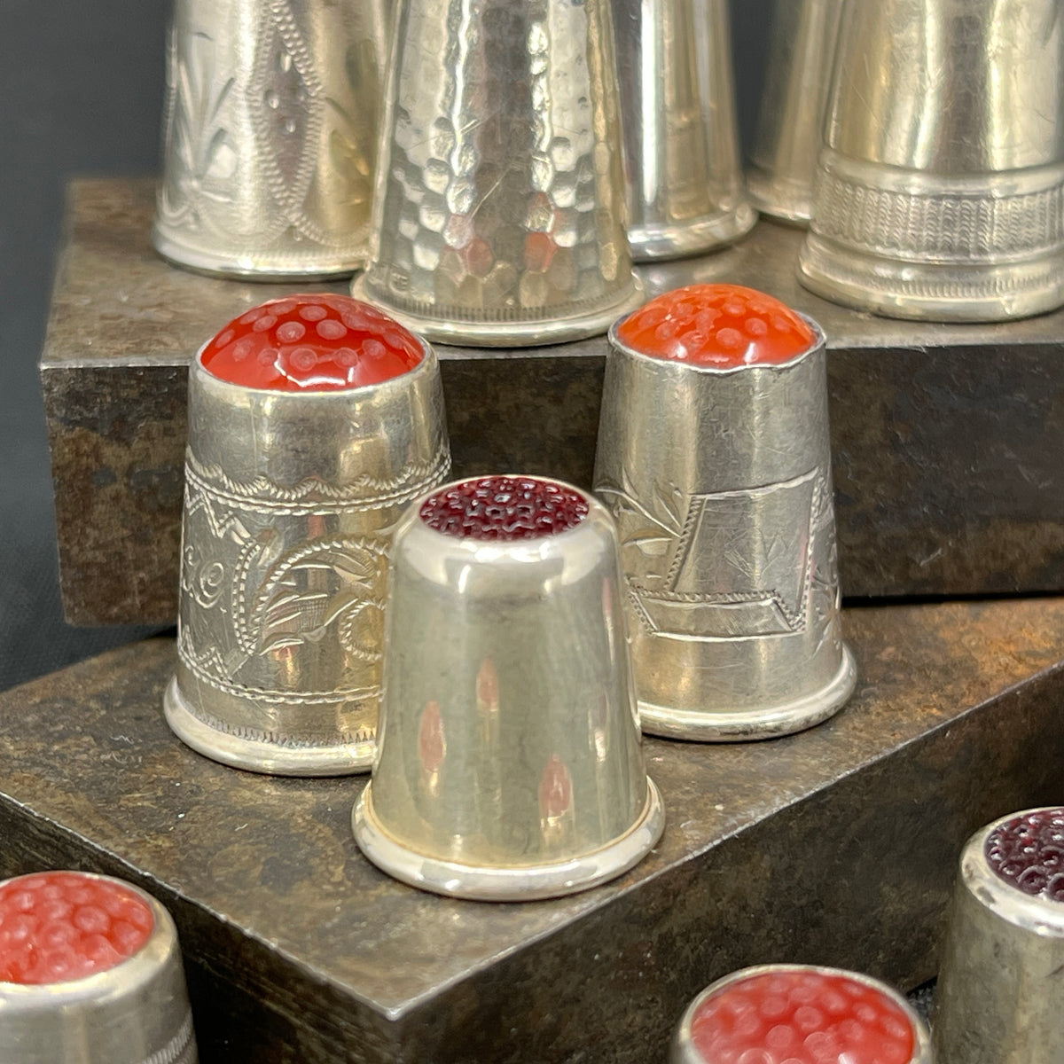 Silver thimble with stones - red shades