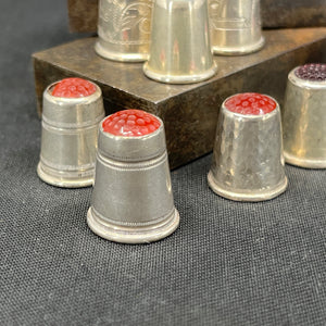 Silver thimble with stones - red shades