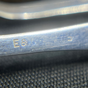 A pair of silver salt spoons No 73
