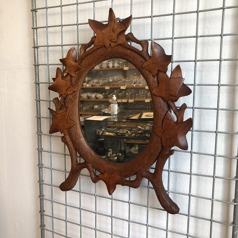 Mirror carved with ivy
