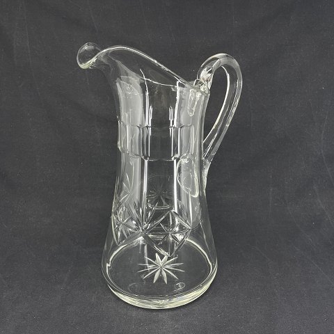 Large glass jug with decor