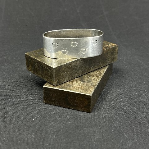 Napkin ring with hearts in silver